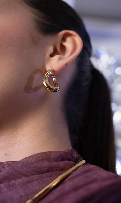 Paul Valentine Molten Twisted Hoops Rabatte dieses Monats