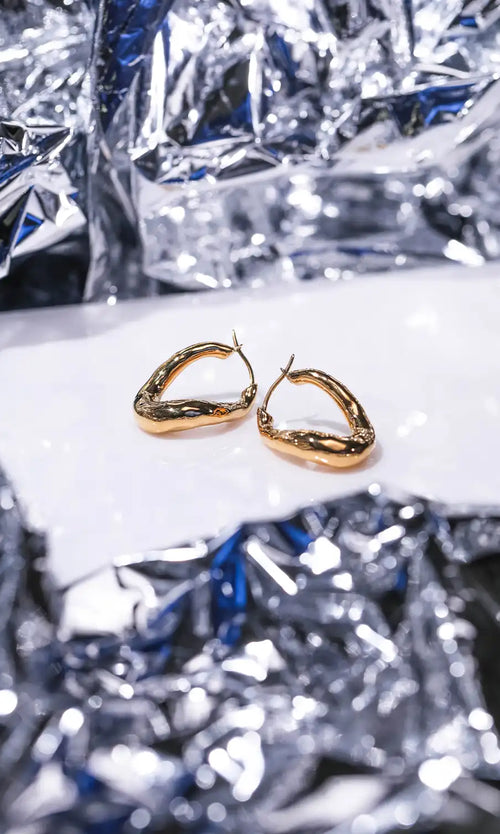 Paul Valentine Molten Twisted Hoops Rabatte dieses Monats