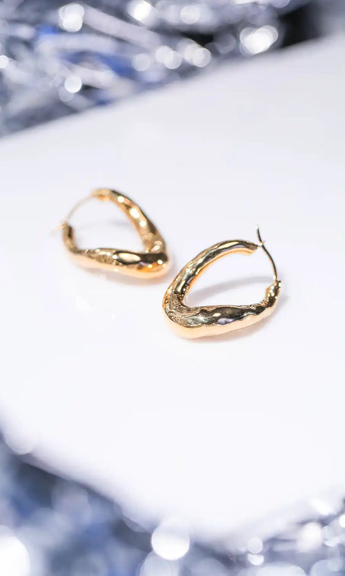 Paul Valentine Molten Twisted Hoops Rabatte dieses Monats