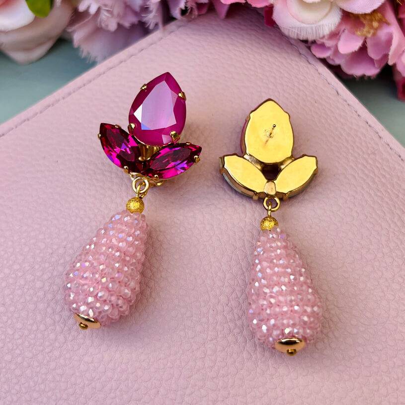 SchwesterSchwester Funkelnde Ohrstecker in Pink mit rosafarbenen Glitzertropfen von AmuseToi Discount Store für neue Produkte